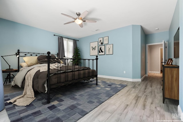 11311 Mezzadro Ave, Bakersfield, CA 93312 - bedroom featuring wood finished floors and ceiling fan