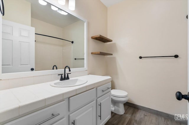 11311 Mezzadro Ave, Bakersfield, CA 93312 - bathroom with vanity, wood finished floors, and a shower