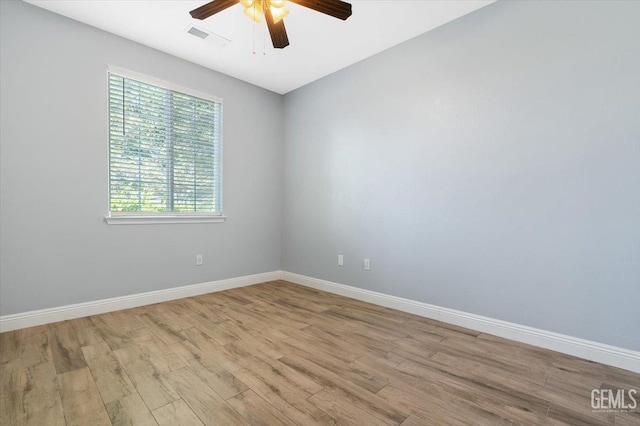11311 Mezzadro Ave, Bakersfield, CA 93312 - spare room with a ceiling fan and wood finished floors