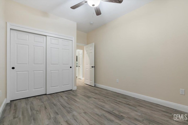 11311 Mezzadro Ave, Bakersfield, CA 93312 - unfurnished bedroom featuring wood finished floors, a closet, and ceiling fan