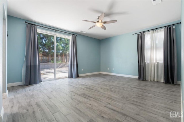 11311 Mezzadro Ave, Bakersfield, CA 93312 - unfurnished room featuring a ceiling fan and wood finished floors