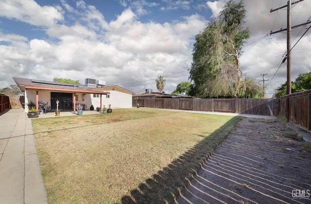 705 Stephens Dr, Bakersfield, CA 93304 - view of yard with a patio area and central AC