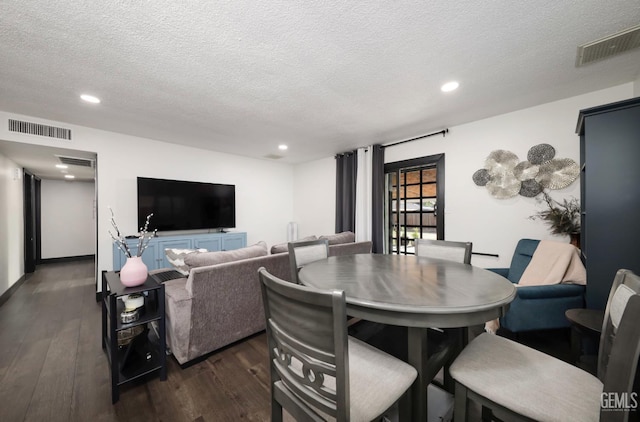 705 Stephens Dr, Bakersfield, CA 93304 - dining room featuring a textured ceiling, recessed lighting, and dark wood finished floors