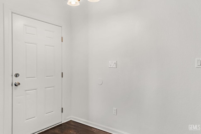 interior space with dark hardwood / wood-style floors