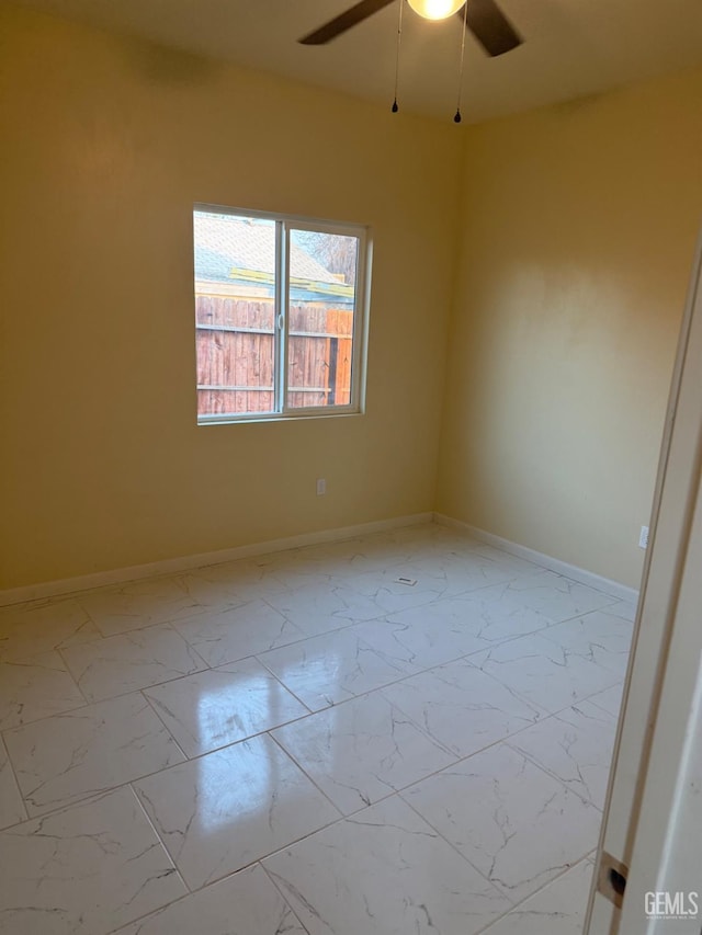 empty room featuring ceiling fan