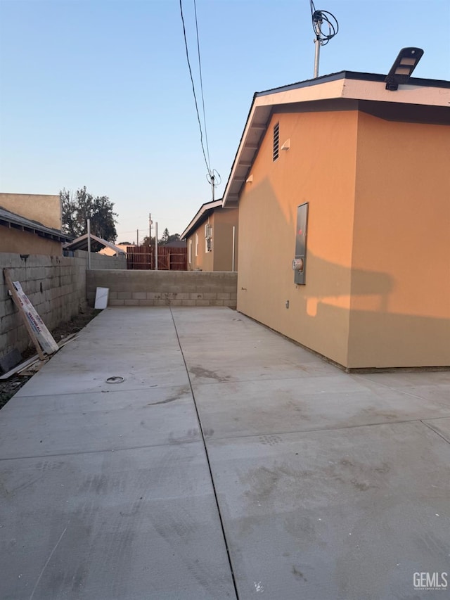 view of home's exterior featuring a patio area