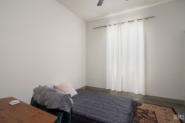 6622 Sycamore Wood Ln, Bakersfield, CA 93313 - bedroom with a ceiling fan and baseboards