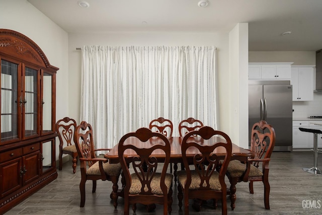 6622 Sycamore Wood Ln, Bakersfield, CA 93313 - dining space with dark wood-style flooring and recessed lighting