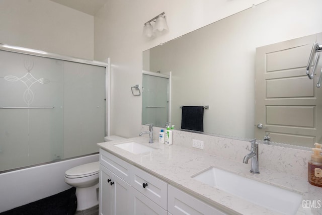 6622 Sycamore Wood Ln, Bakersfield, CA 93313 - bathroom featuring double vanity and combined bath / shower with glass door