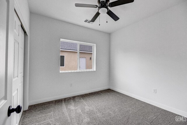 1627 Tejon St, Bakersfield, CA 93305 - unfurnished bedroom featuring carpet, a closet, baseboards, and a ceiling fan