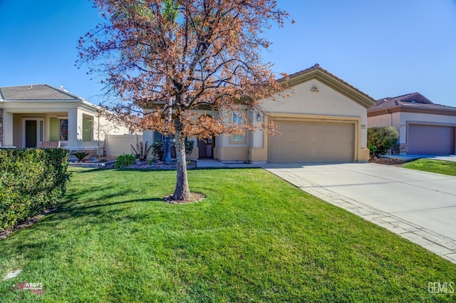 view of front of home featuring a garage and a front yard