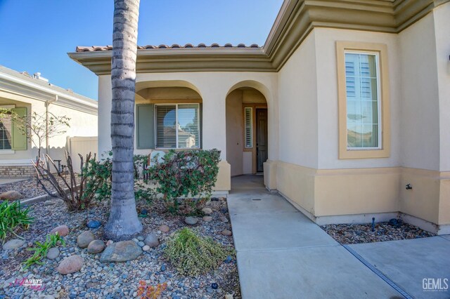 mediterranean / spanish house featuring a front lawn