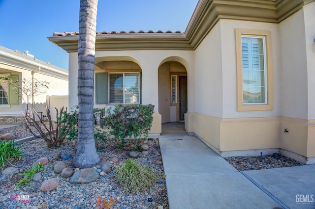 mediterranean / spanish house featuring a front lawn