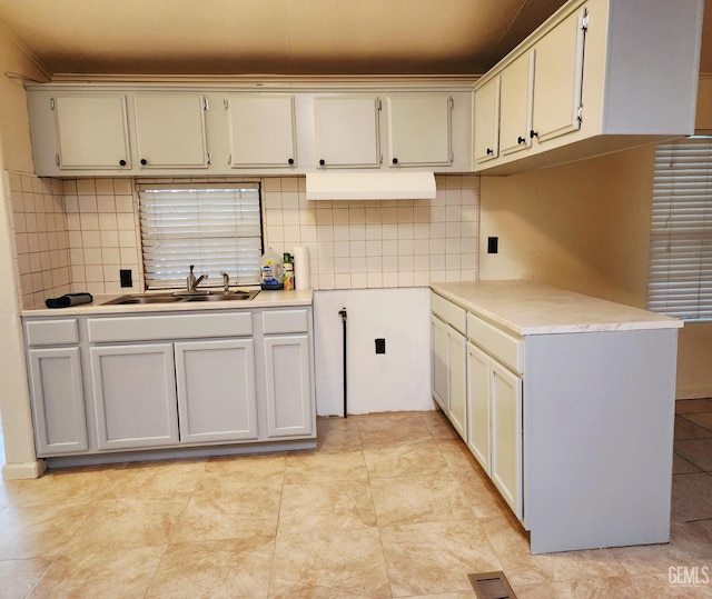 200 5th Ave Unit 32, Arvin, CA 93203 - kitchen featuring a sink, backsplash, and light countertops