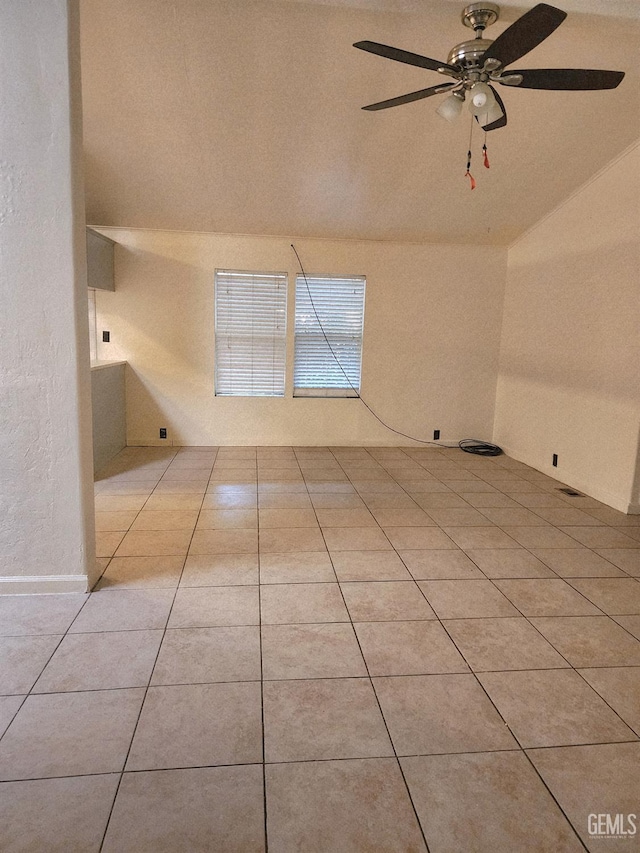 200 5th Ave Unit 32, Arvin, CA 93203 - spare room with ceiling fan, vaulted ceiling, and light tile patterned floors