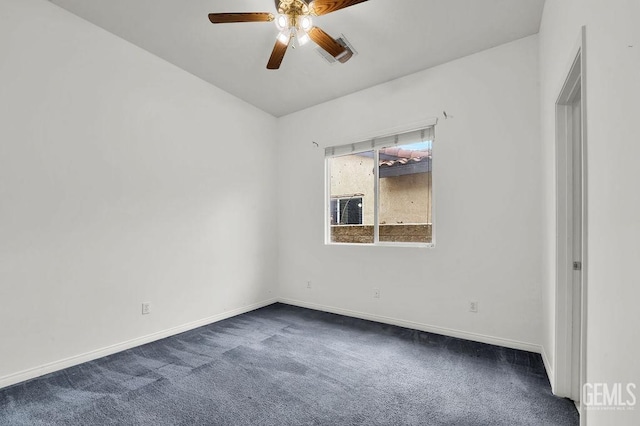 empty room with baseboards, a ceiling fan, and dark carpet