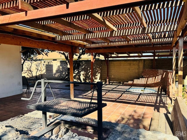 view of patio featuring a pergola