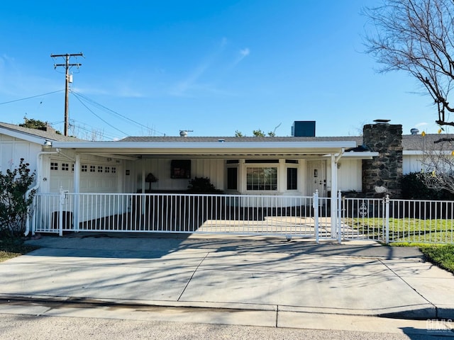 ranch-style home featuring a garage