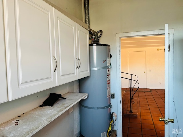 utility room with secured water heater