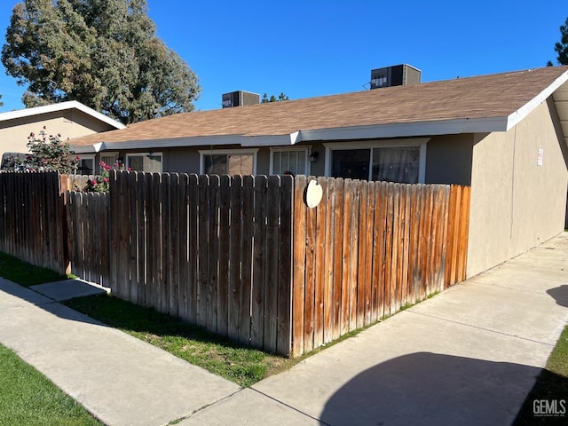 view of property exterior featuring central AC