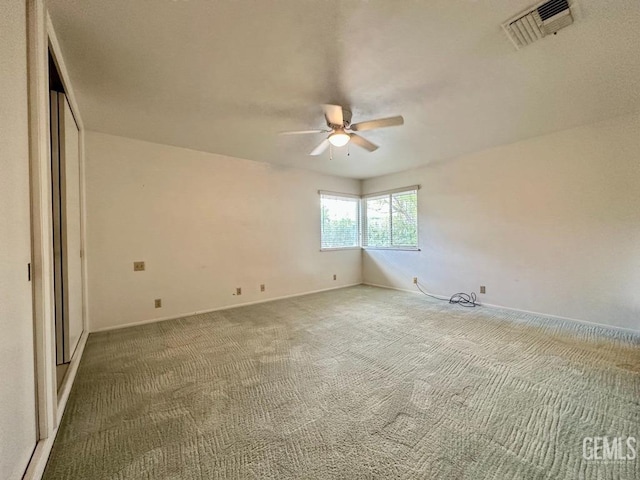 unfurnished bedroom with carpet floors and ceiling fan