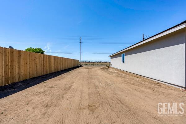 664 Fresno Ave, Shafter, CA 93263 - view of dirt / gravel road