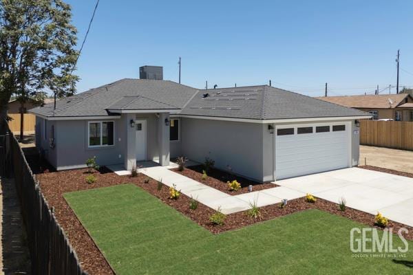 664 Fresno Ave, Shafter, CA 93263 - ranch-style house featuring an attached garage, a fenced backyard, driveway, stucco siding, and a shingled roof