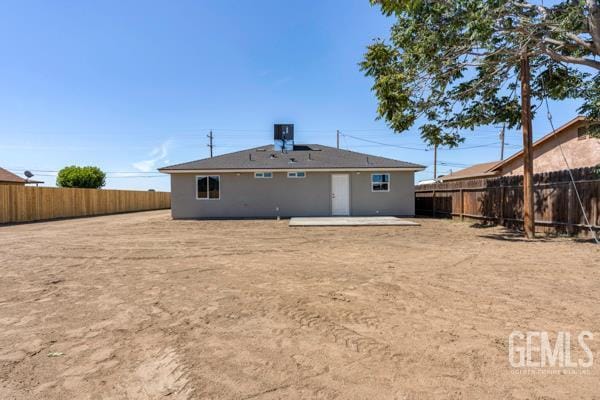 664 Fresno Ave, Shafter, CA 93263 - rear view of property with a fenced backyard and a patio