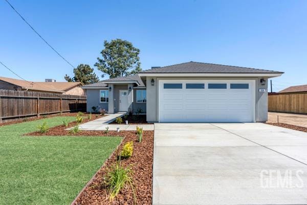 664 Fresno Ave, Shafter, CA 93263 - ranch-style house featuring driveway, stucco siding, and a garage