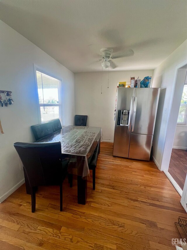 1405 Chester Ave, Bakersfield, CA 93301 - dining area featuring a ceiling fan and light wood-type flooring
