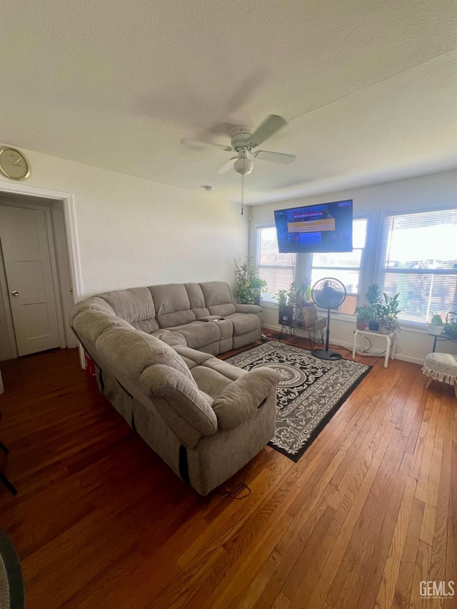 1405 Chester Ave, Bakersfield, CA 93301 - living area with hardwood / wood-style floors, ceiling fan, and a textured ceiling