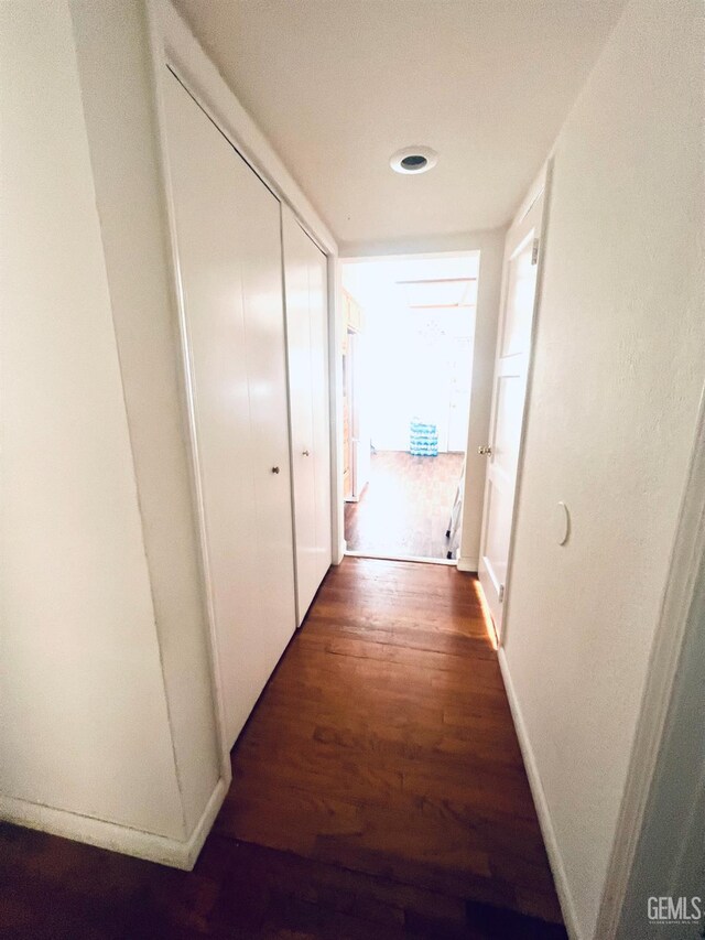 1405 Chester Ave, Bakersfield, CA 93301 - hallway with wood finished floors and baseboards