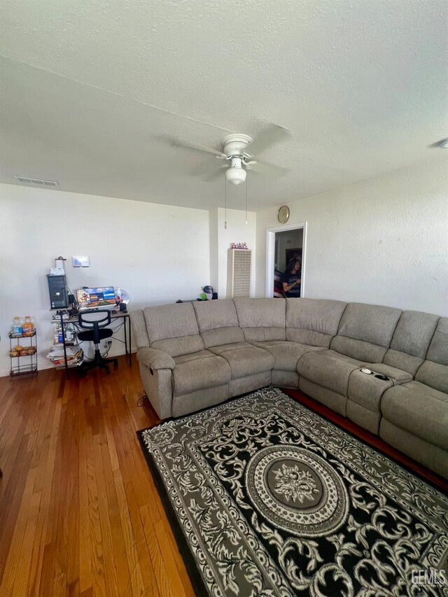 1405 Chester Ave, Bakersfield, CA 93301 - living area featuring wood-type flooring and a ceiling fan