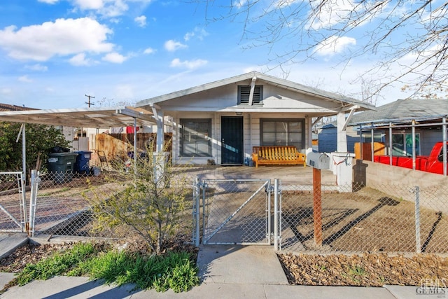 210 B B, Taft, CA 93268 - shotgun-style home with covered porch, a gate, and a fenced front yard