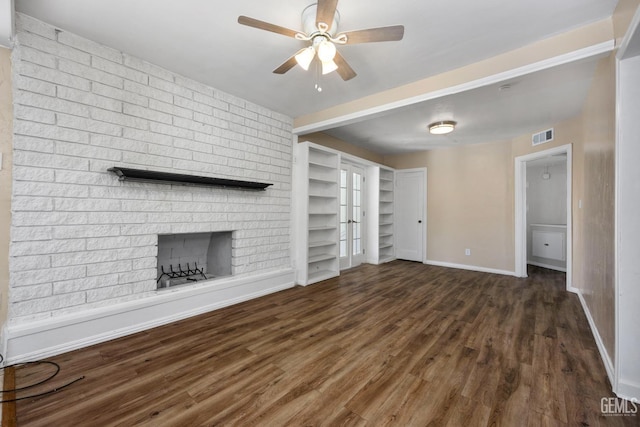 2805 Charleston Dr, Bakersfield, CA 93308 - unfurnished living room featuring wood finished floors, ceiling fan, a brick fireplace, and visible vents