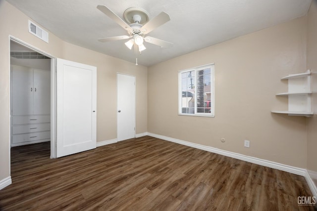 2805 Charleston Dr, Bakersfield, CA 93308 - unfurnished bedroom featuring a closet, baseboards, a ceiling fan, visible vents, and wood finished floors