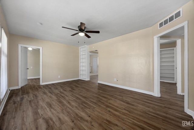 2805 Charleston Dr, Bakersfield, CA 93308 - empty room featuring visible vents, ceiling fan, baseboards, and dark wood finished floors