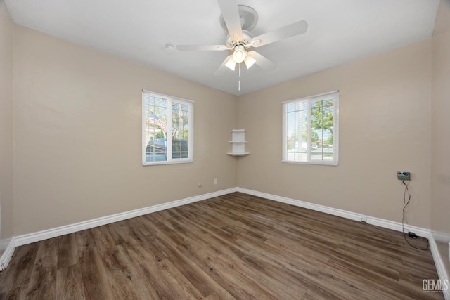 2805 Charleston Dr, Bakersfield, CA 93308 - spare room featuring baseboards, a ceiling fan, and wood finished floors