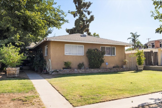 view of property exterior featuring a lawn