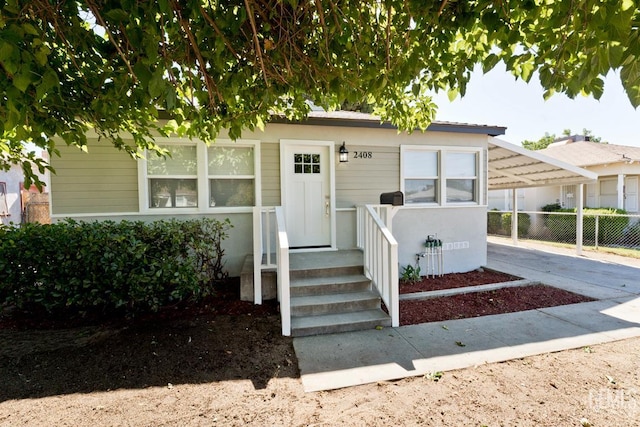 2408 Charleston Dr, Bakersfield, CA 93308 - view of front of home featuring an attached carport and driveway