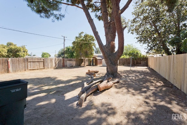 2408 Charleston Dr, Bakersfield, CA 93308 - fenced backyard with a storage shed