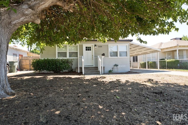 2408 Charleston Dr, Bakersfield, CA 93308 - view of front of house with an attached carport