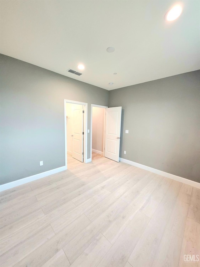 unfurnished bedroom featuring light hardwood / wood-style flooring