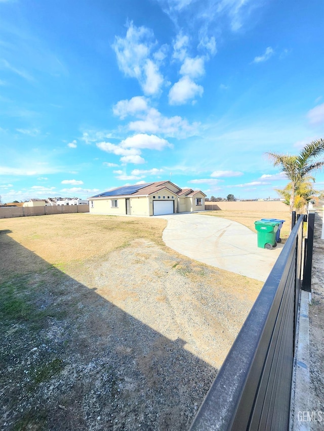 view of yard featuring a garage