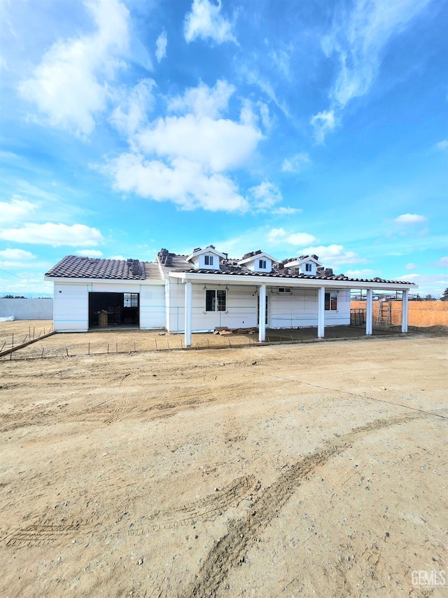 single story home featuring a garage