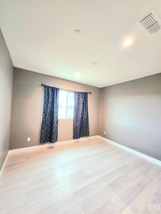 empty room featuring light hardwood / wood-style flooring