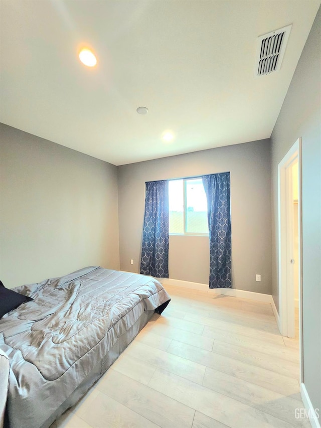 bedroom featuring light hardwood / wood-style flooring