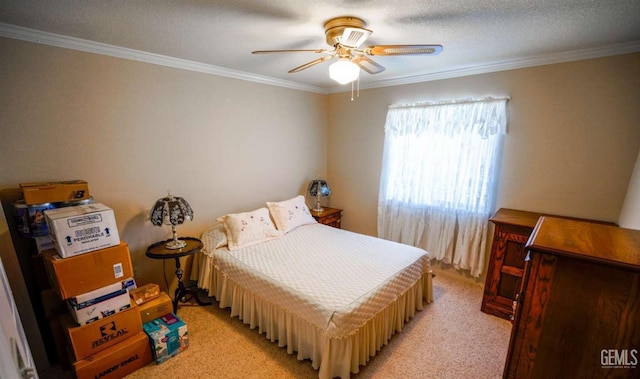 carpeted bedroom with crown molding and ceiling fan