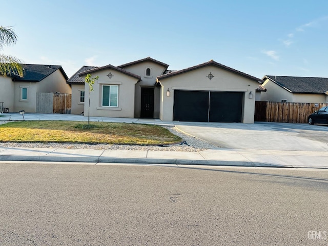 7904 Bristol Spring Ave, Bakersfield, CA 93313 - single story home featuring a garage, stucco siding, driveway, and a tile roof