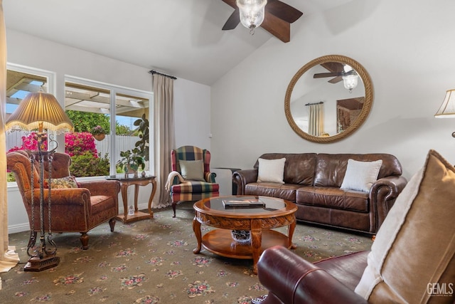 carpeted living room featuring ceiling fan, lofted ceiling with beams, and baseboards